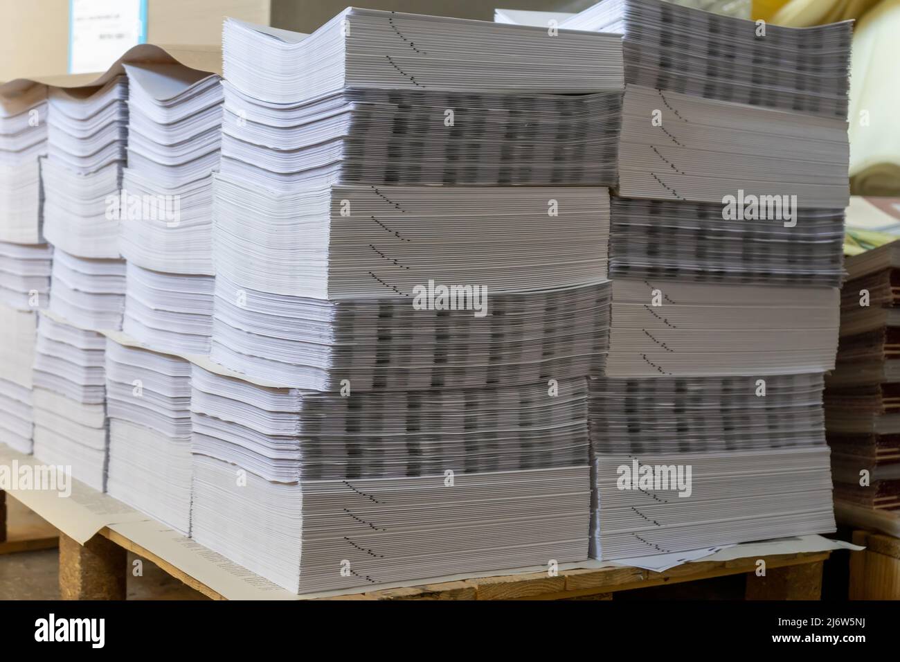 Paper books stack in printing or publishing company Stock Photo - Alamy