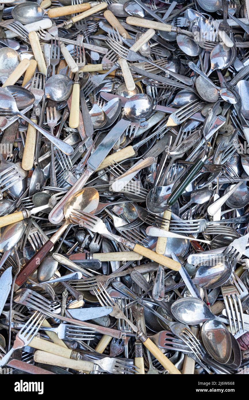 A selection of old cutlery in a junk shop in Yorkshire, England UK