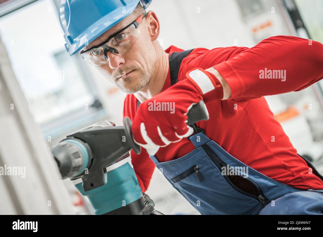 Professional Construction Contractor Drilling Another Hole For an