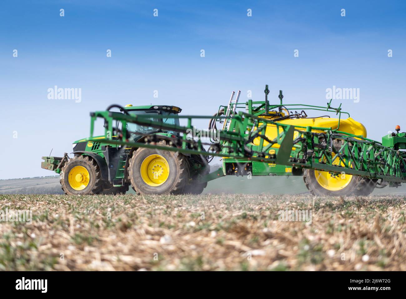 Spraying arable crop on the Yorkshire Wolds near York, using a John