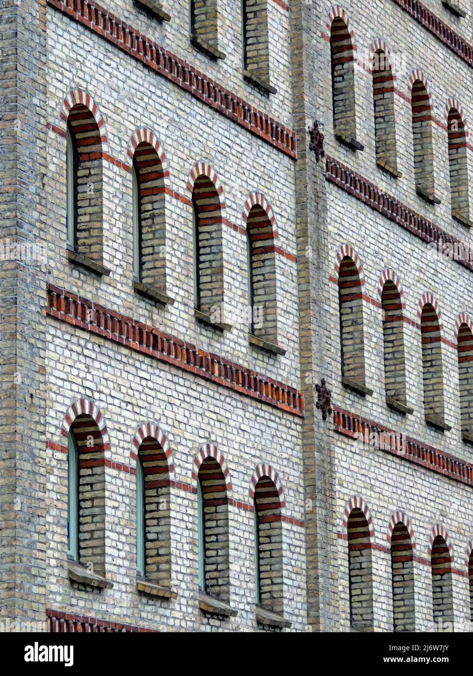 Facade of old brick factory building in diagonal perspective Stock ...