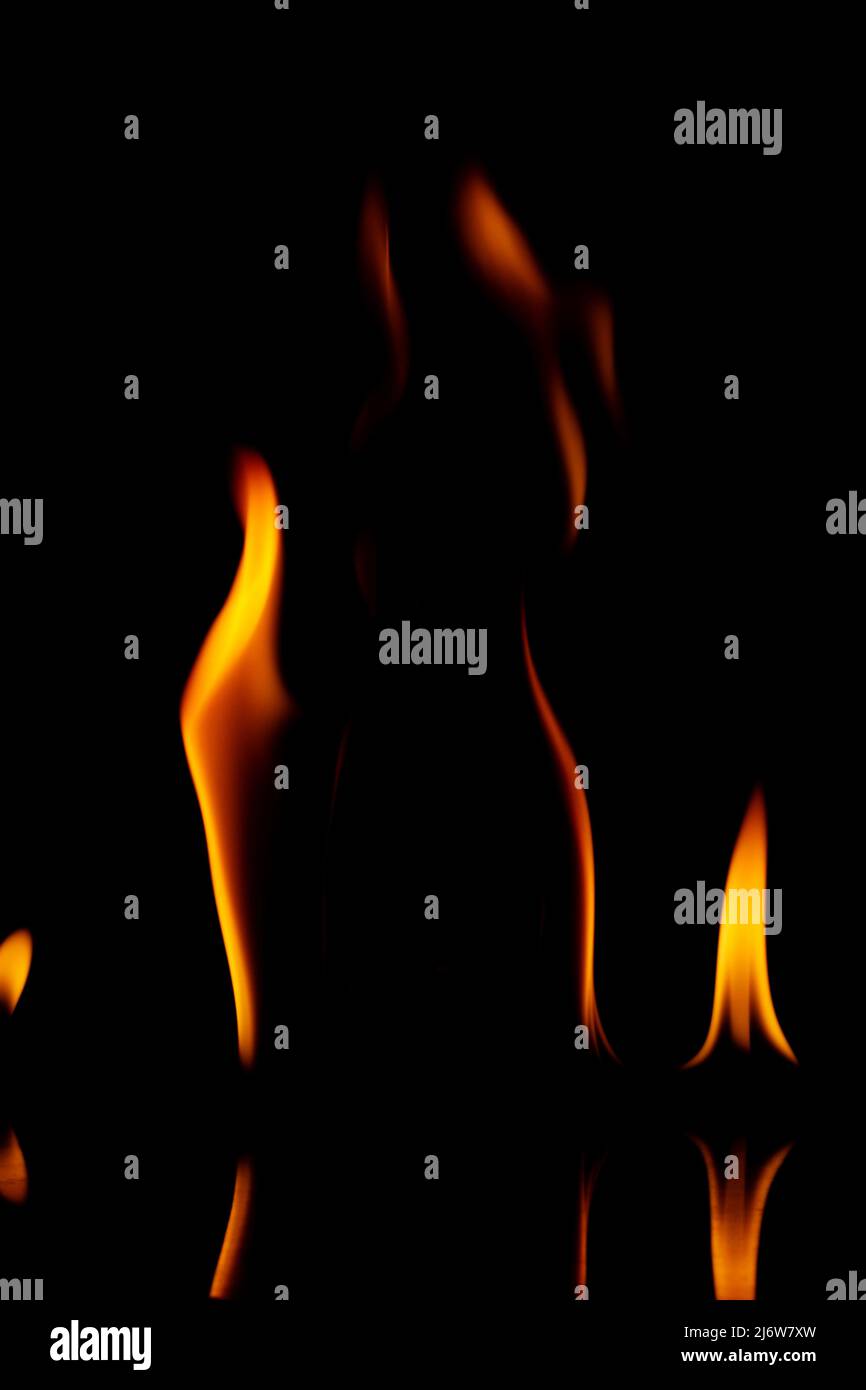 Fire flames isolated on a black background Stock Photo - Alamy