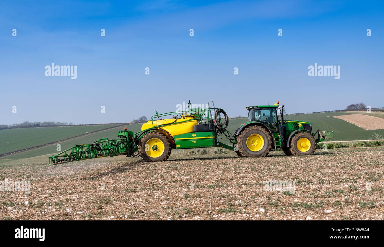 Spraying arable crop on the Yorkshire Wolds near York, using a John