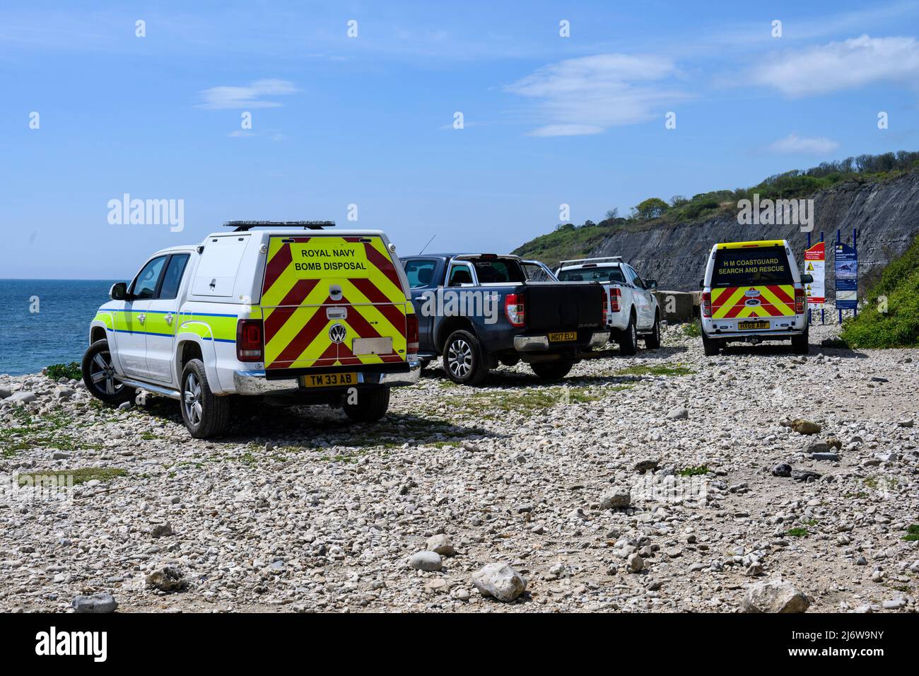Lyme Regis, Dorset, UK. 3rd May 2022. UK News: Police clear Monmouth Beach at Lyme Regis following reports of a suspect item being spotted in the sea. Royal Navy bomb disposal experts and the HM Coastguard were also in attendance. Credit: Celia McMahon/Alamy Live News Stock Photo