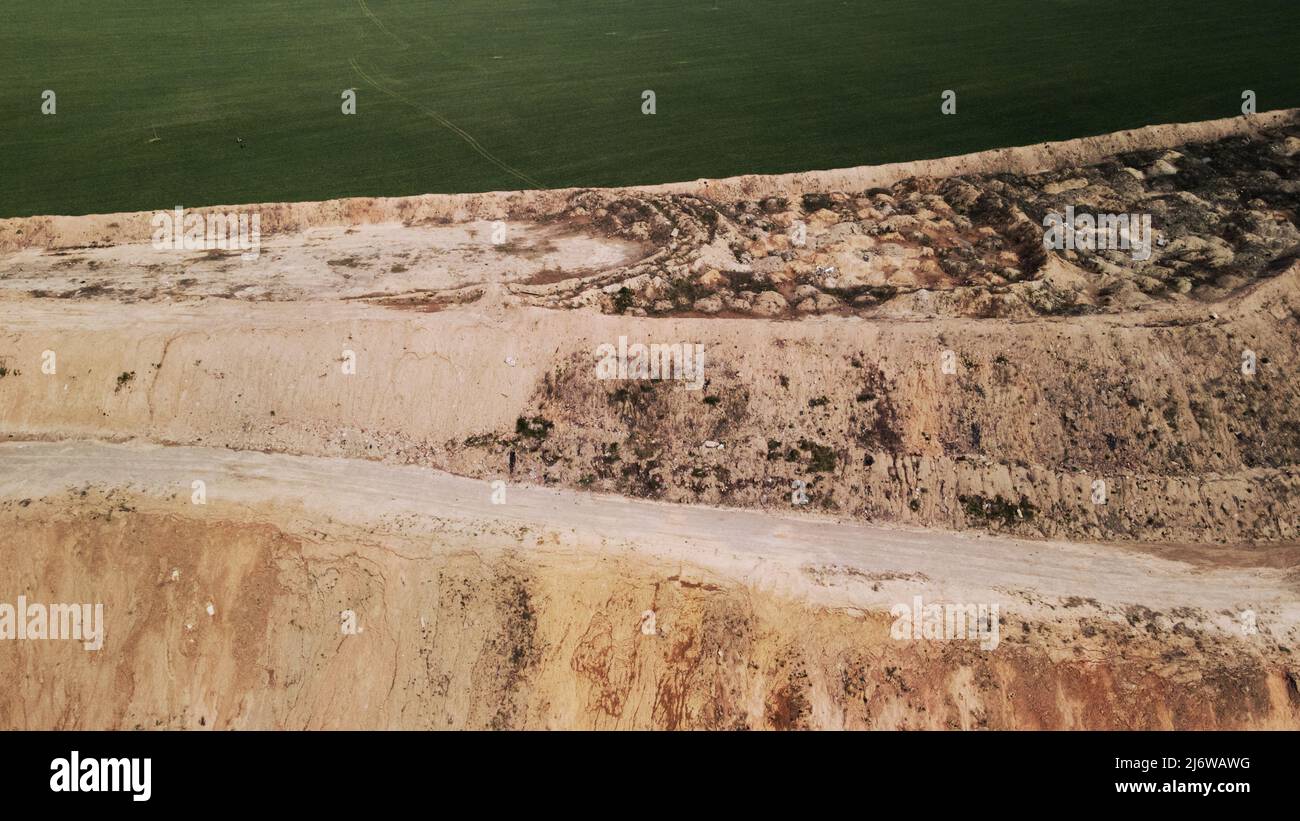 Conserved landfill for household waste. A mound of rubbish. Aerial