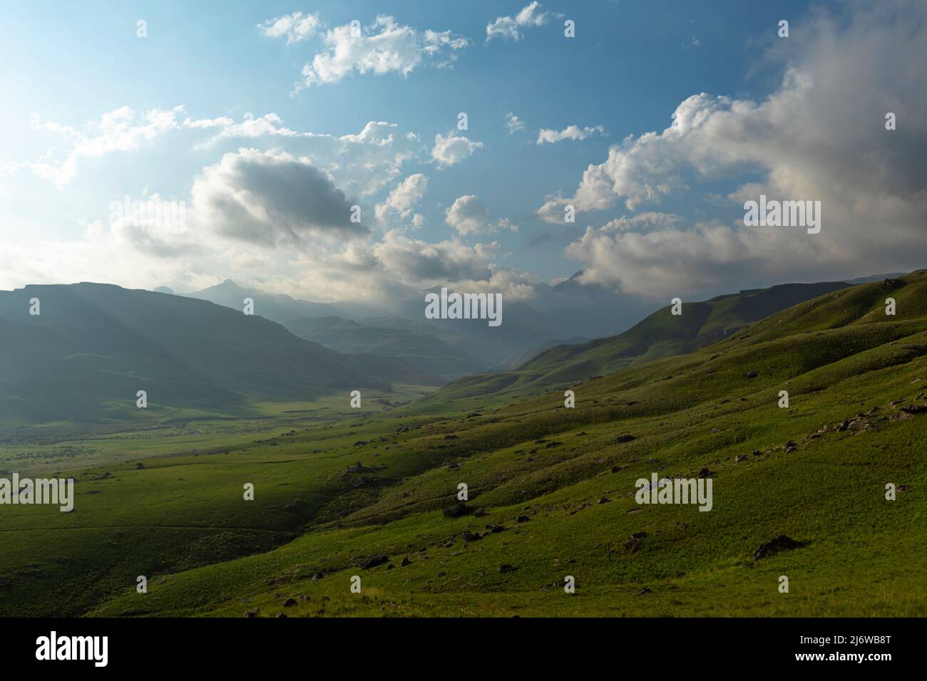 Low clouds above green valley in the mountain Drakensberg South Africa ...