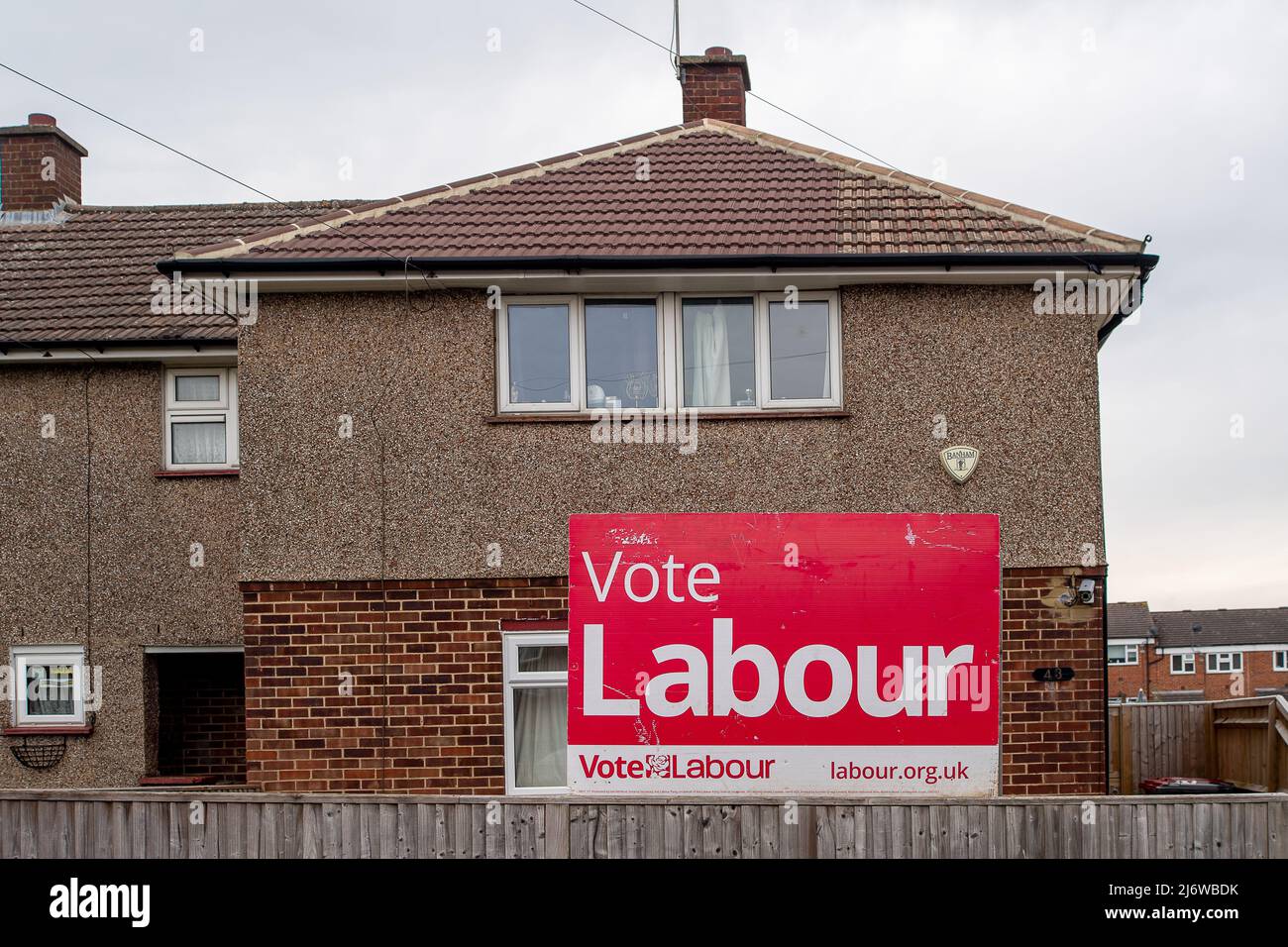 Slough, Berkshire, UK. 4th May, 2022. Boards outside residential homes promoting the Labour party in Slough. Following the handling of the Covid-19 crisis, the PPE scandal, Partygate and the cost of living crisis, the Tory party are predicted to lose hundreds of seats in the local elections tomorrow. Credit: Maureen McLean/Alamy Live News Stock Photo