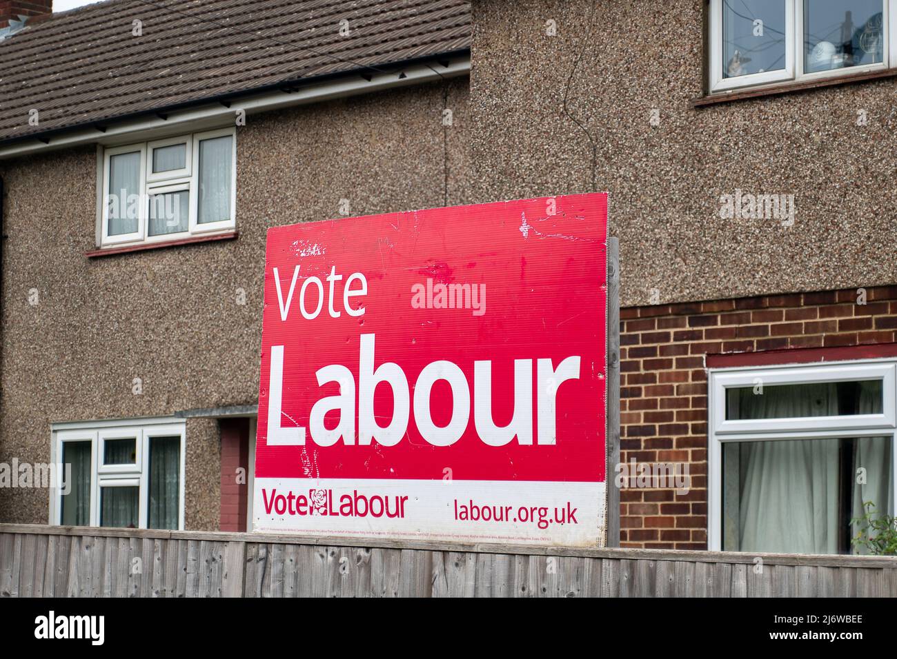 Slough, Berkshire, UK. 4th May, 2022. Boards outside residential homes promoting the Labour party in Slough. Following the handling of the Covid-19 crisis, the PPE scandal, Partygate and the cost of living crisis, the Tory party are predicted to lose hundreds of seats in the local elections tomorrow. Credit: Maureen McLean/Alamy Live News Stock Photo