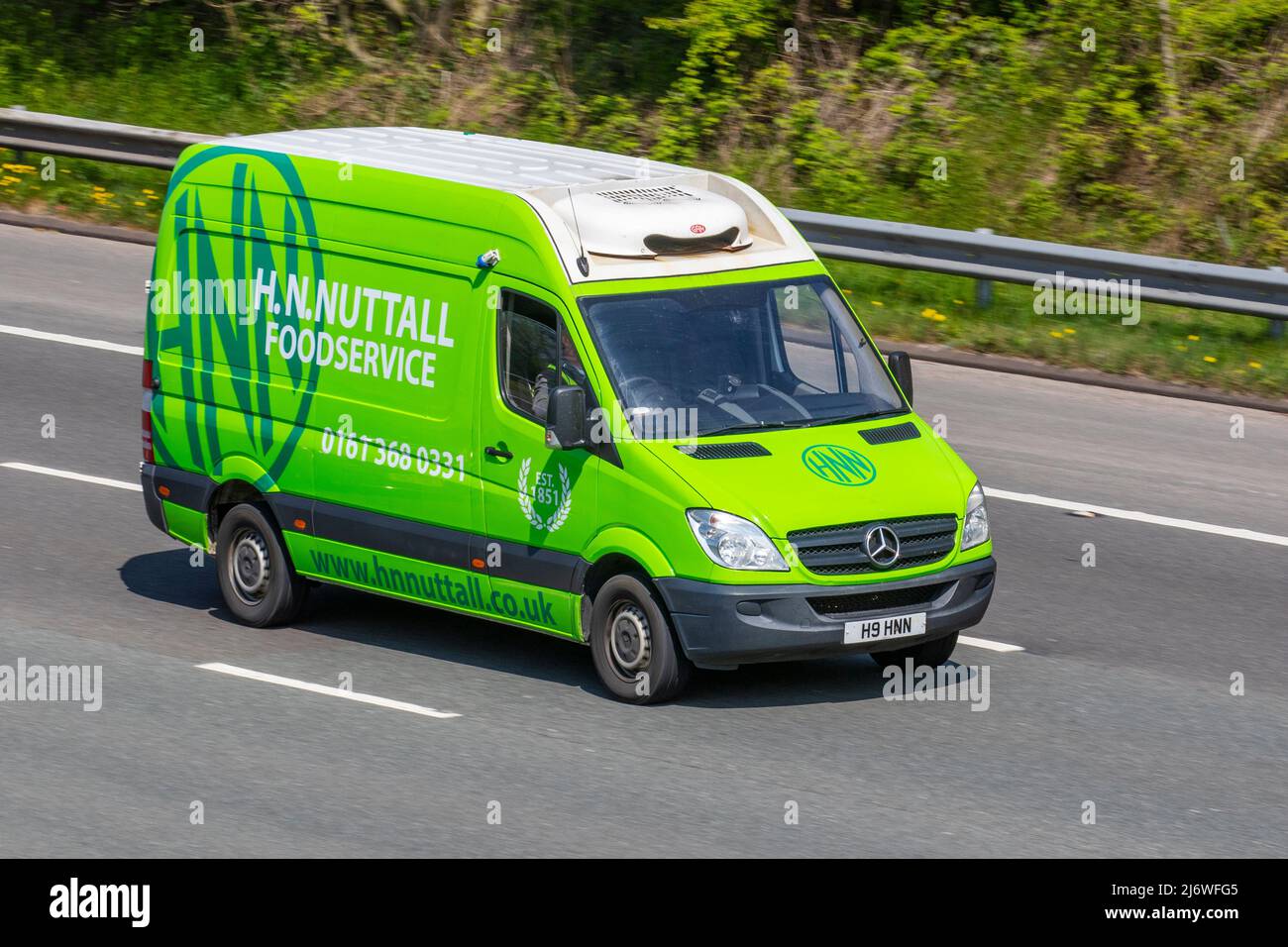 H.N.Nuttall FoodService Mercedes Benz 2014 Sprinter green van driving on the M61 Manchester, UK Stock Photo
