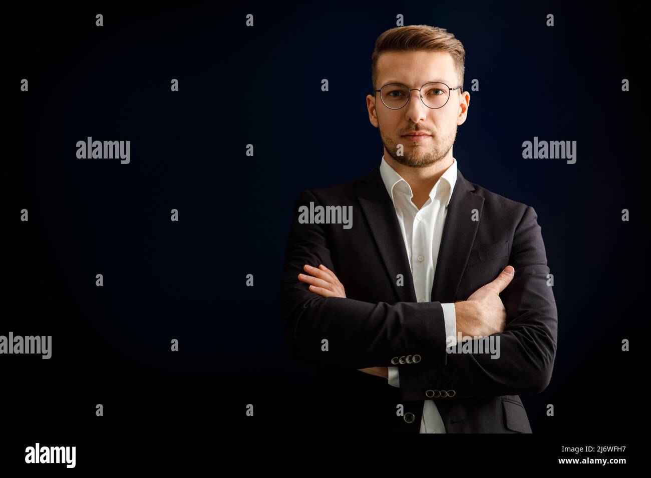 Male model in black suit hi-res stock photography and images - Alamy