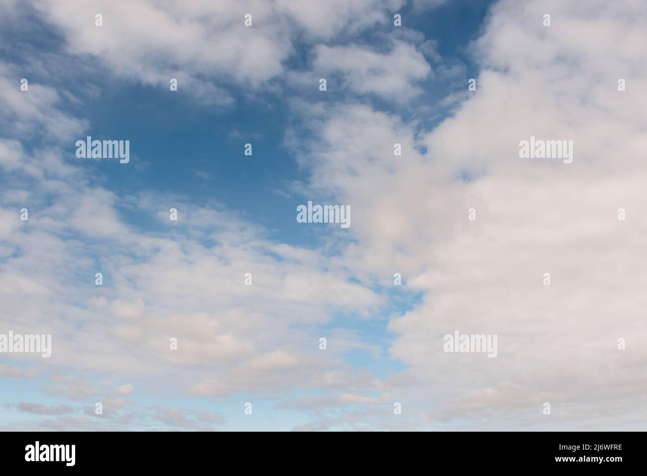 Blue sky with clouds in summer hi-res stock photography and images - Alamy