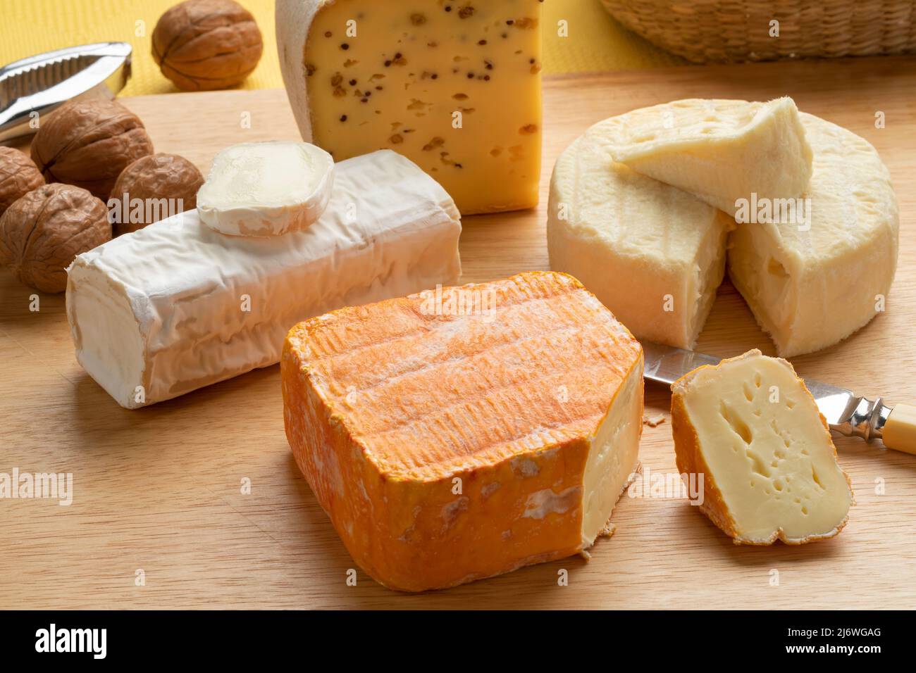 Cheese platter with French and belgian cheese on a cutting board close up Stock Photo