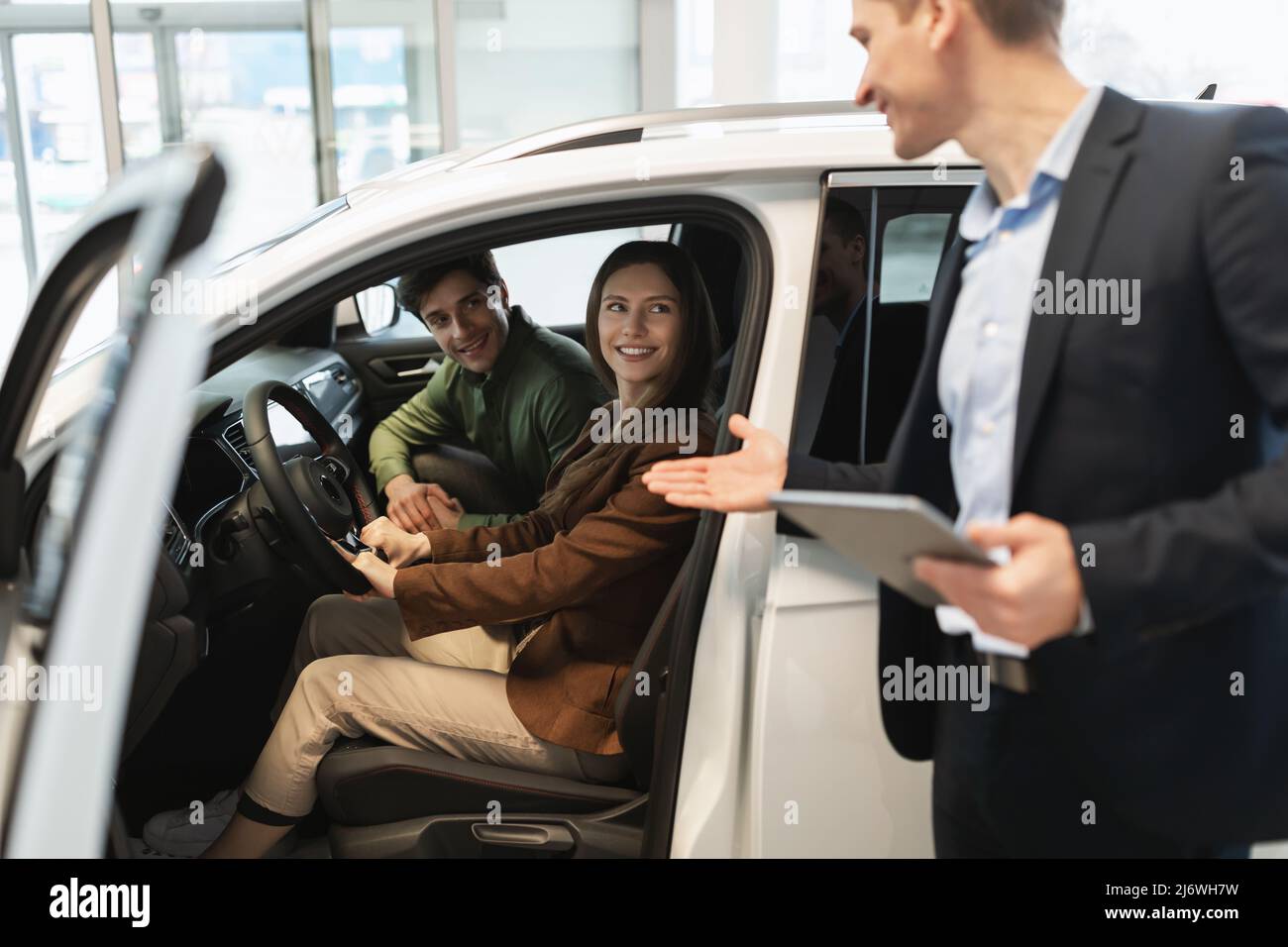 Test drive car salesman hi-res stock photography and images - Alamy