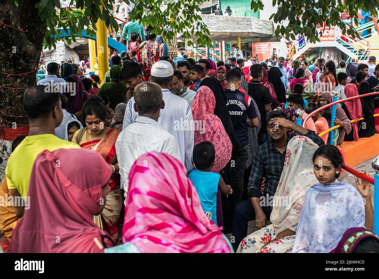 Dhaka, Bangladesh, 04/05/2022, People seen visiting the DNCC Wonderland (Shishu Mela) during the Eid Holiday. Without any restrictions all the amusement centers open to welcome more people for the first time since covid-19 hit the country, the government has allowed tourist spots, community centers and amusement parks to resume services. Stock Photo