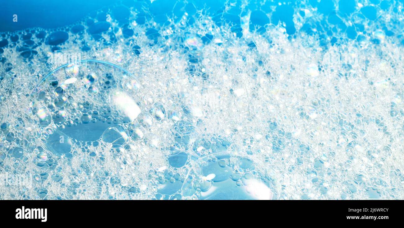 Close up of soap bubbles for laundry detergent, spa or washing powder concepts. Clean symbol macro photography for packaging advertising or wellness o Stock Photo