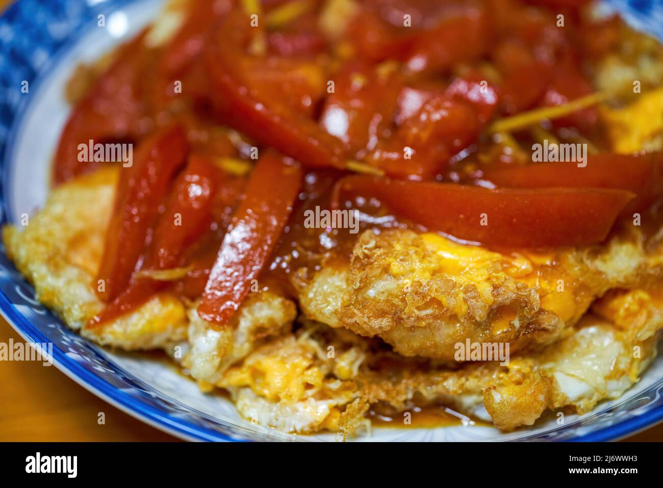 A delicious Chinese homestyle dish, sweet and sour fried egg with five