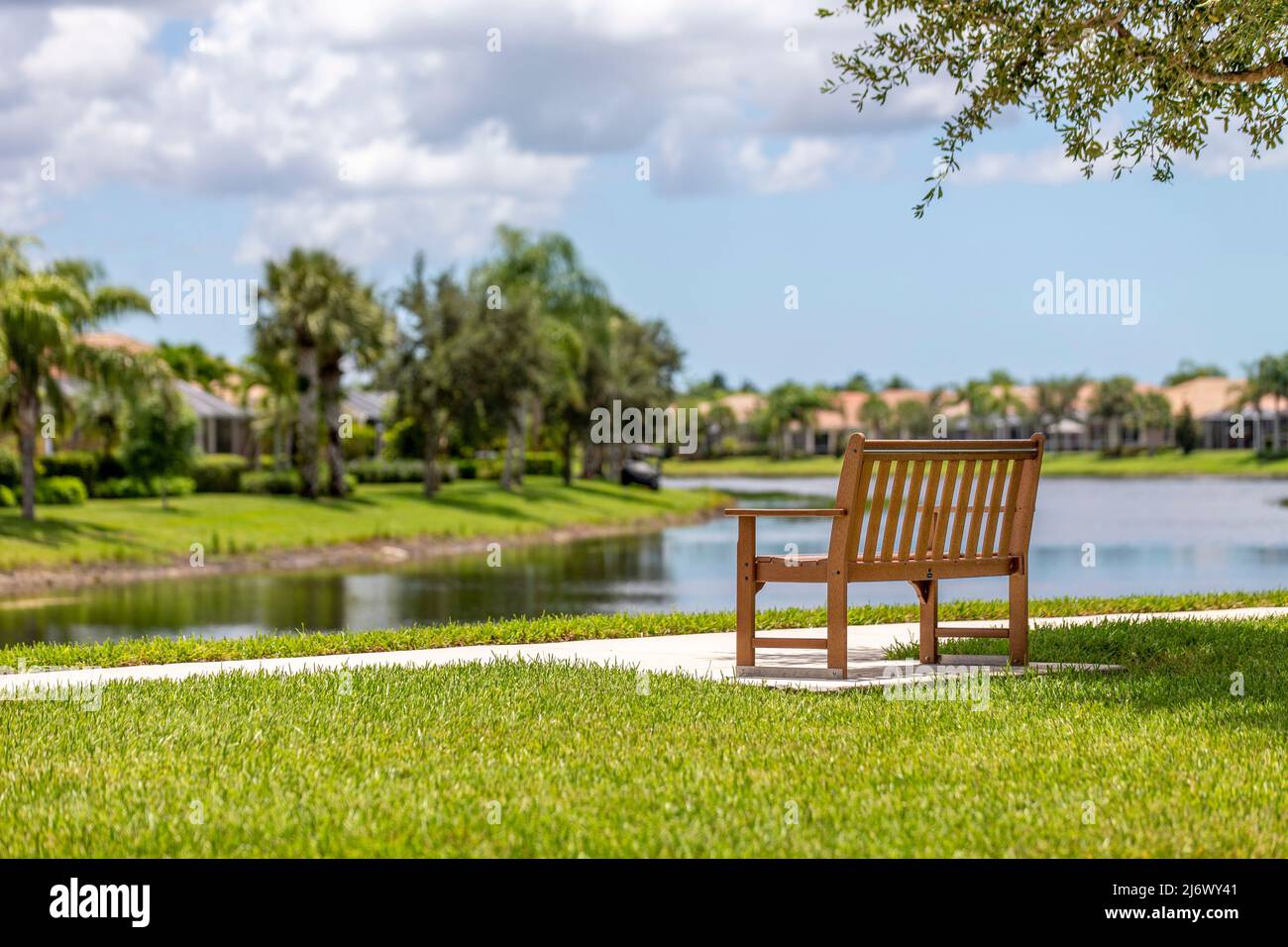 Verona Walk Naples Real Estate Park Bench by a lake Stock Photo Alamy