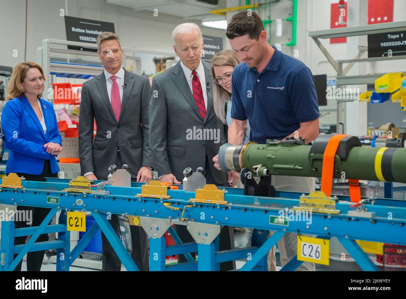 Troy, United States of America. 03 May, 2022. U.S President Joe Biden listens to workers building a Javelin anti-tank missiles launcher as Lockheed Martin CEO Jim Taiclet, left, looks on, during a tour of the Lockheed Martin Pike County Operations facility, May 3, 2022, in Troy, Alabama. Credit: Adam Schultz/White House Photo/Alamy Live News Stock Photo