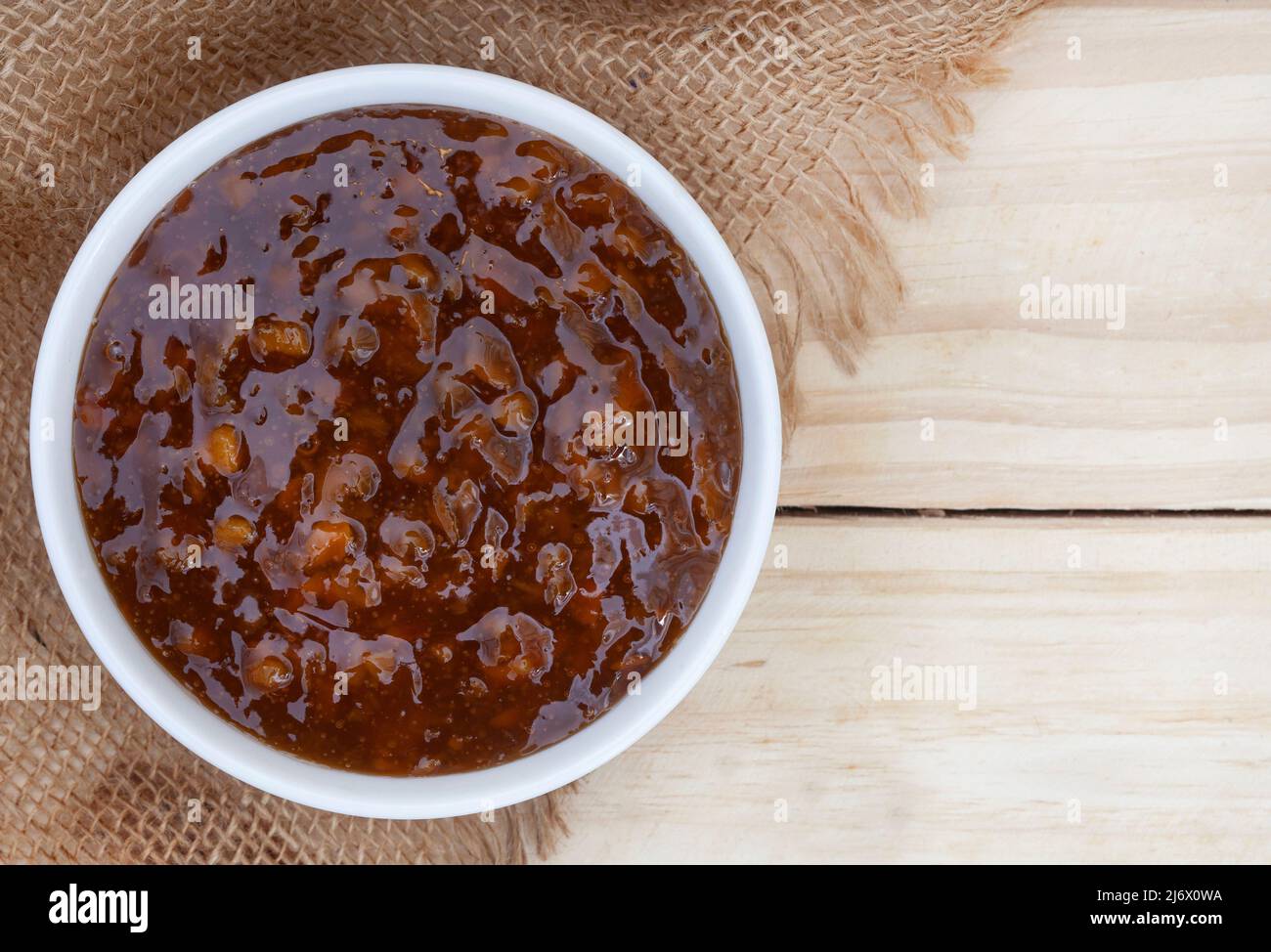 Traditional South African fruit chutney, a popular condiment in a white