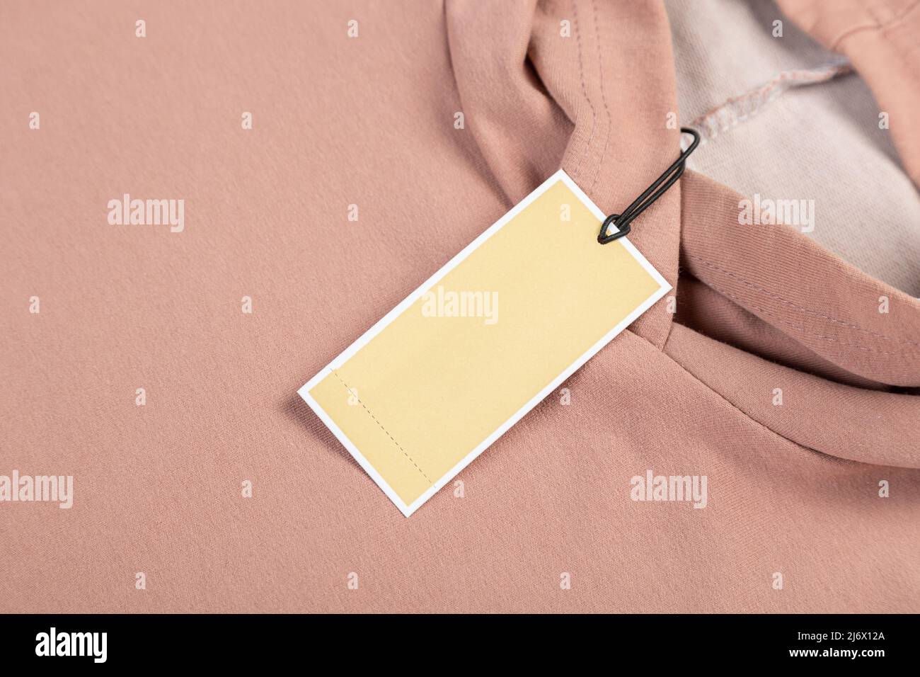 Plain clothing price tag close up place for your text or logo Stock