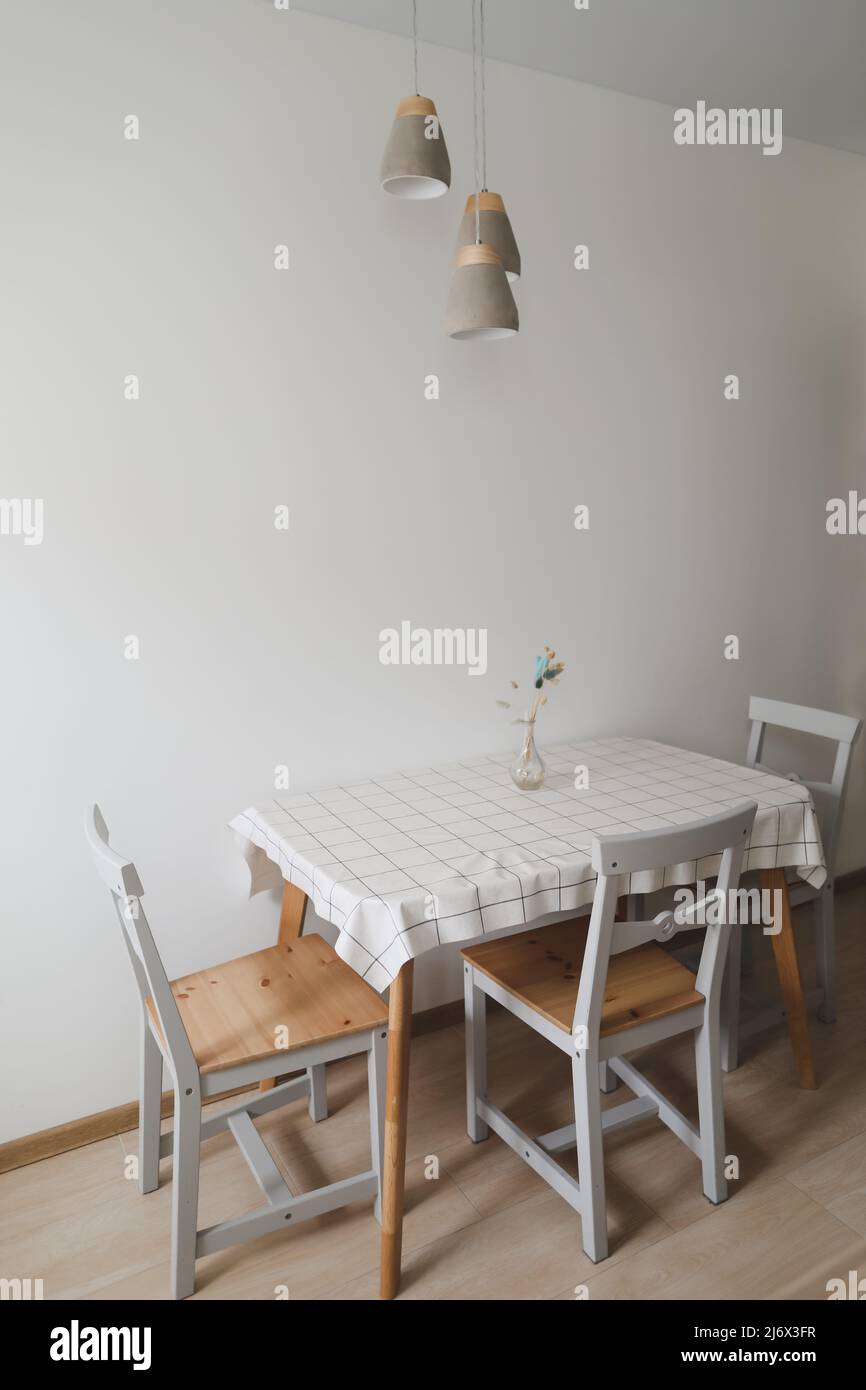 Cozy modern kitchen with wooden table and chairs Stock Photo Alamy