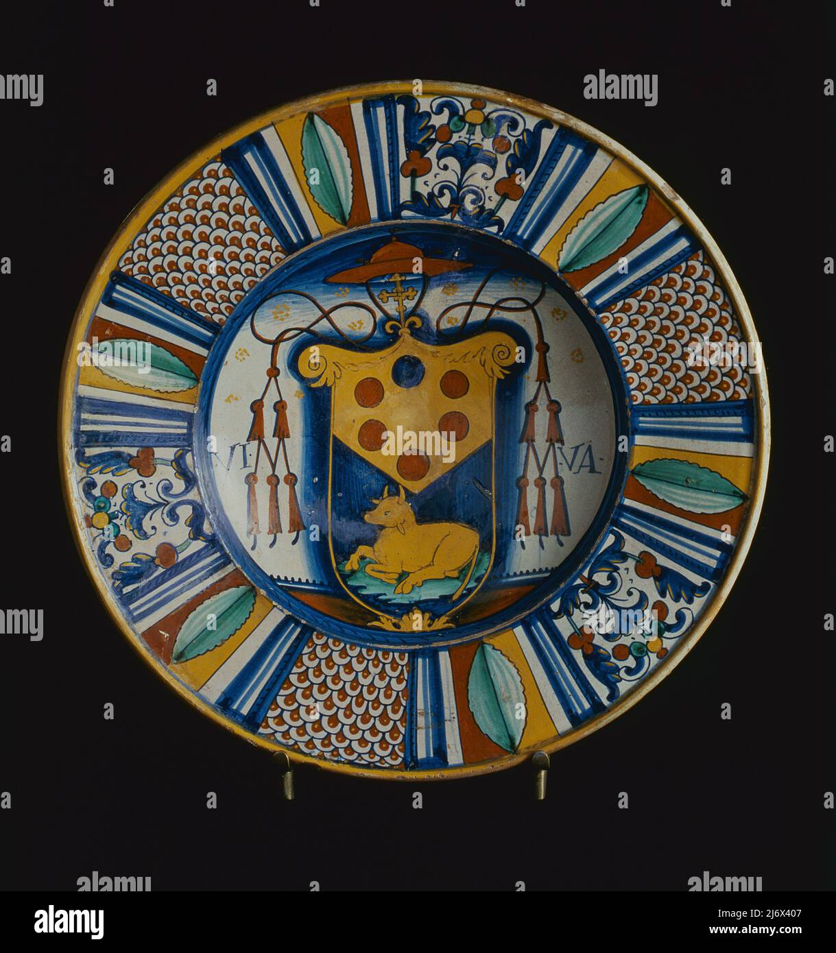 Maiolica plate decorated with the coat of arms of a Medici-Passerini cardinal, Italian, 16th century (ceramic); Museo Nazionale del Bargello, Florence, Tuscany, Italy;  out of copyright. Stock Photo