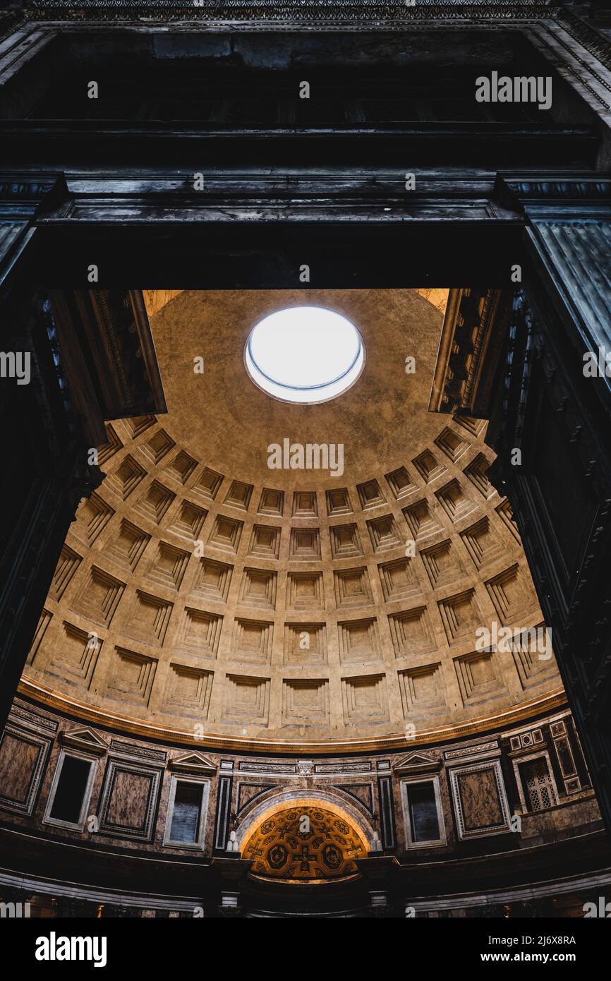 Italy, Rome, Pantheon interior with coffered dome with oculus as seen from the entrance doors, an ancient Roman temple and church. Stock Photo