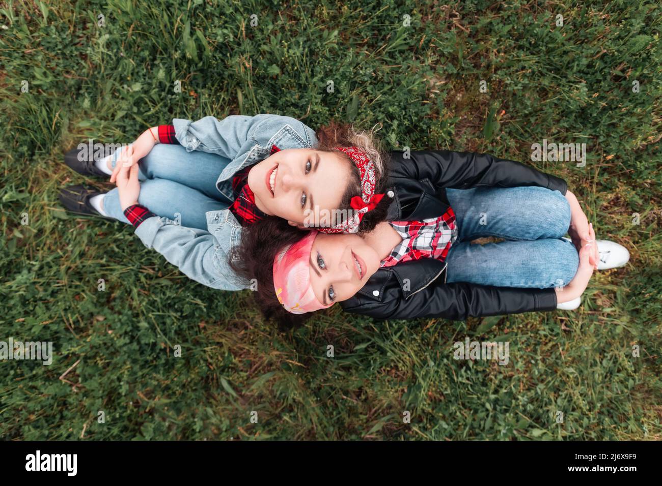 Teen girl sitting knees up hi-res stock photography and images - Alamy