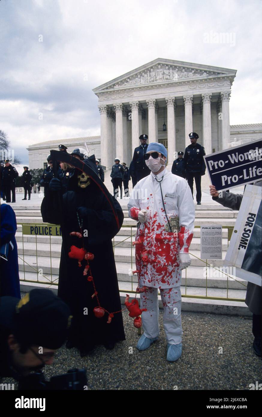 Pro Life activists march from the Ellipse to the Supreme Court January 23, 1995 in Washington, DC. The pro lifers were met with opposition groups in favor of abortion. Stock Photo