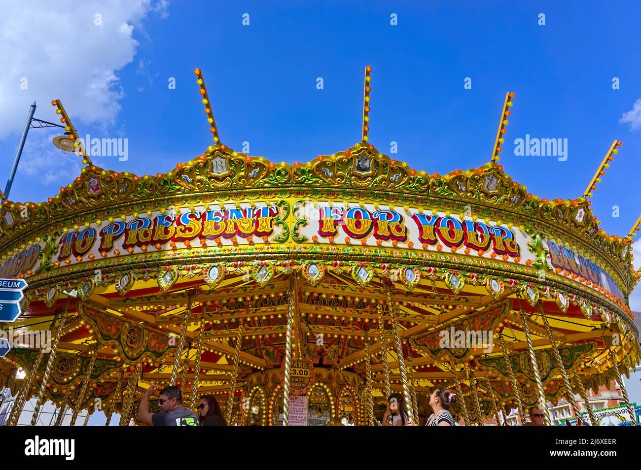 a Merry go round ride at the annual May fair Stock Photo