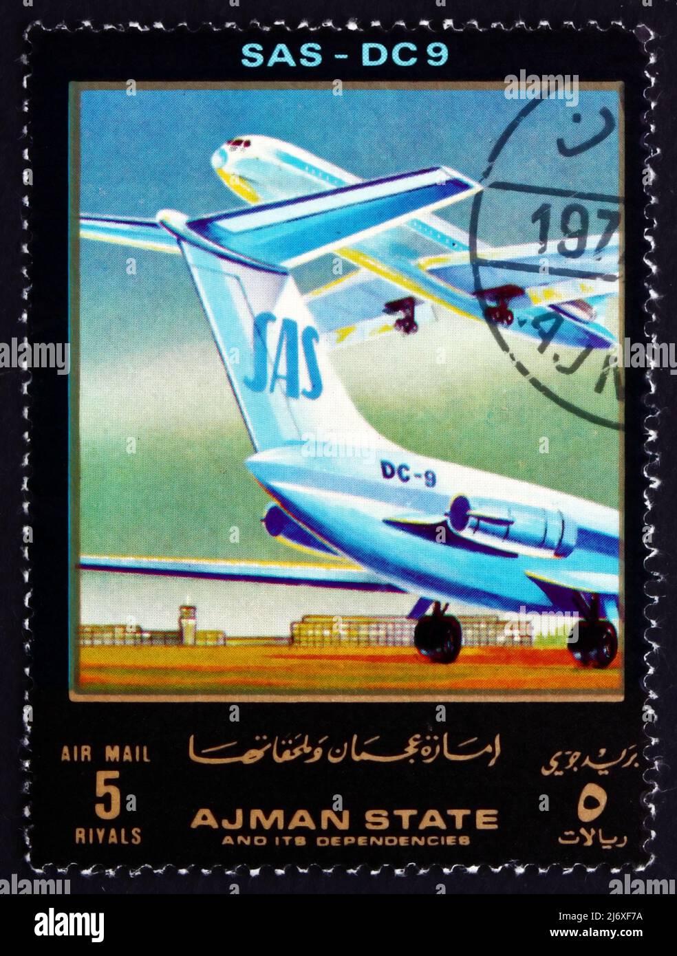 AJMAN - CIRCA 1972: a stamp printed in the Ajman shows DC 9, SAS, Airliner, circa 1972 Stock Photo
