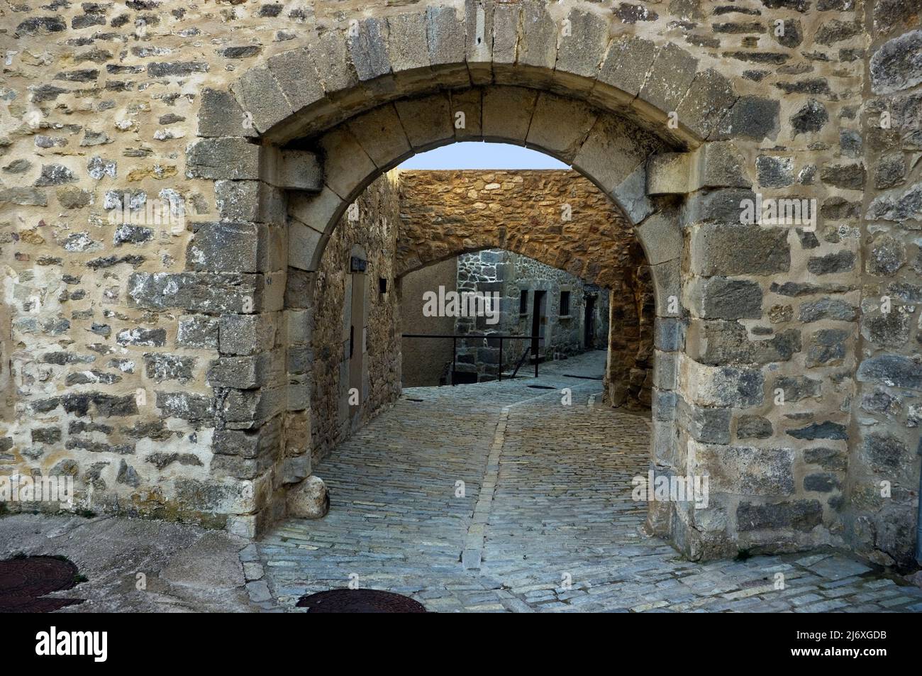 Street with arched doors in the town of Ares del Maestrat in the province of Castellón Spain. Stock Photo