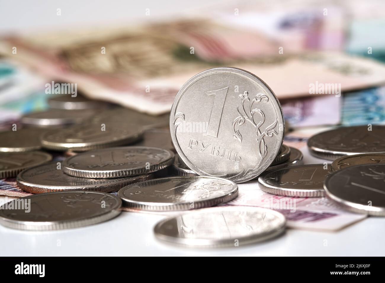 Background, blur, out of focus, bokeh, pasteurization. Coins of the Russian ruble. The rise of the ruble exchange rate. Payment for gas in Russian cur Stock Photo