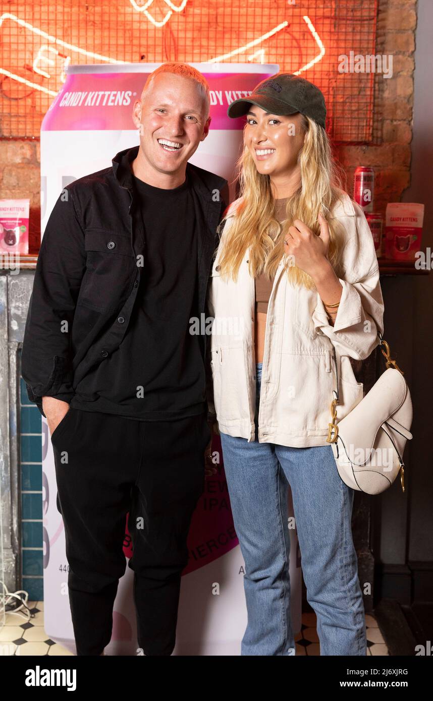 EDITORIAL USE ONLY Jamie Laing, founder of Candy Kittens and Sophie Habboo arrive at the launch