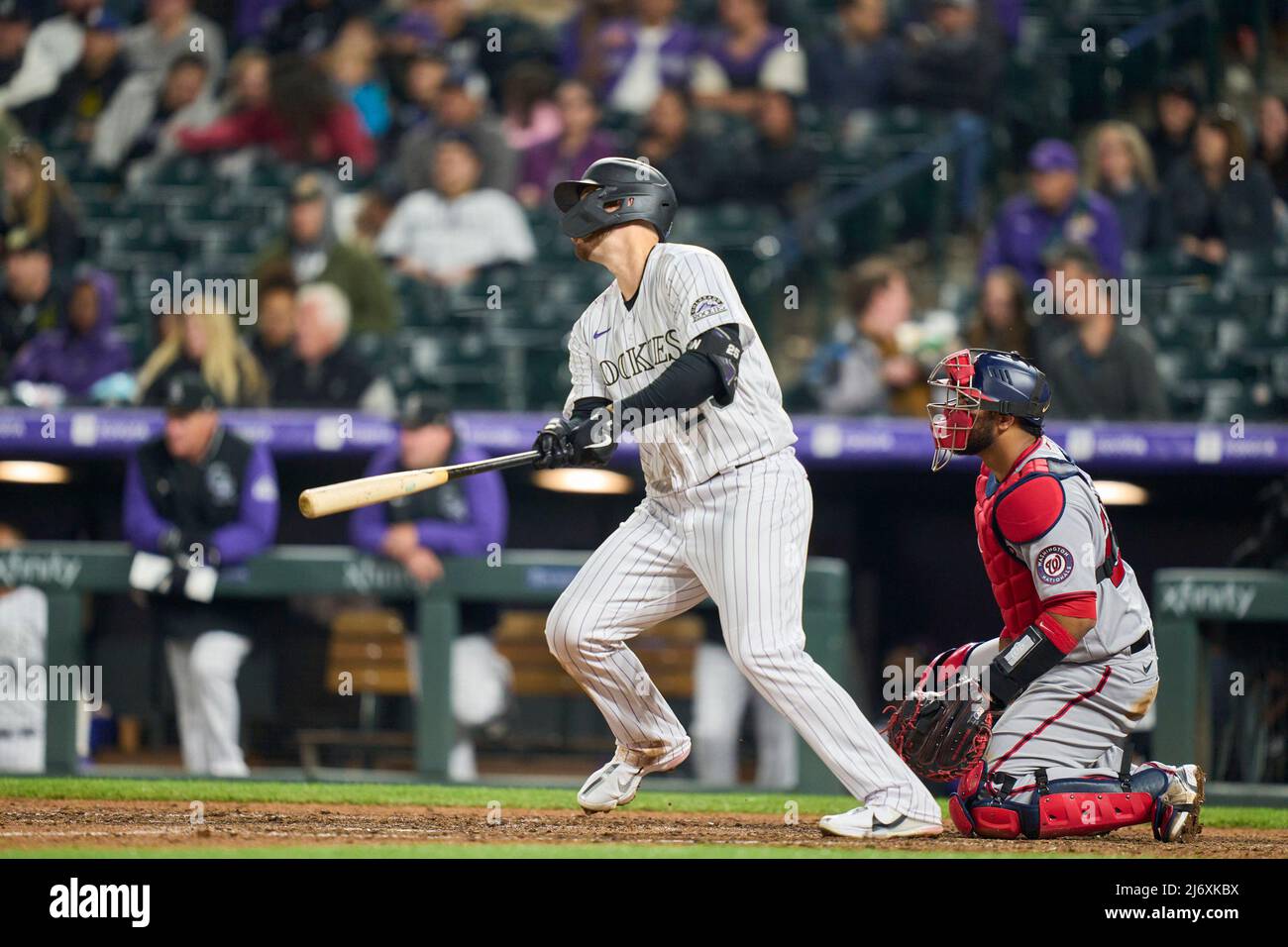 May 3 2022: Colorado first baseman C.J. Cron (25) gets a hit during the  game with Washington Nationals and Colorado Rockies held at Coors Field in  Denver Co. David Seelig/Cal Sport Medi(Credit