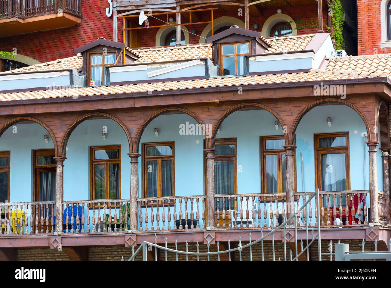 House with traditional wooden carving balcony of Old Town of Tbilisi, Georgia Stock Photo