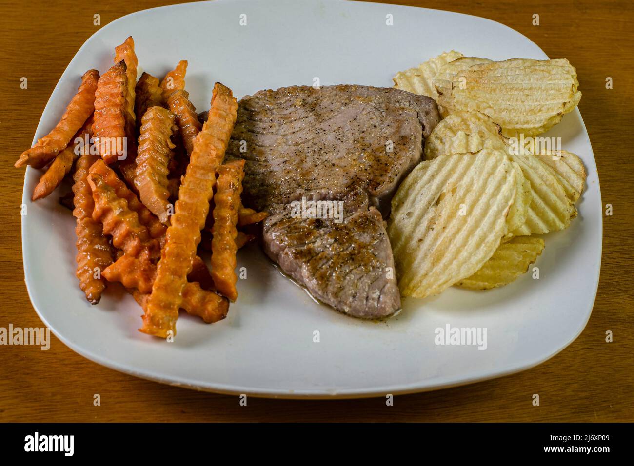 Steak with sweet potato fries hi-res stock photography and images - Alamy