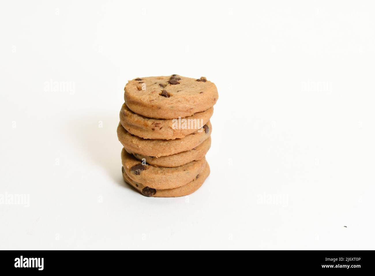 Stack of yummy tasty chocolate chip cookies isolated on a white background Stock Photo
