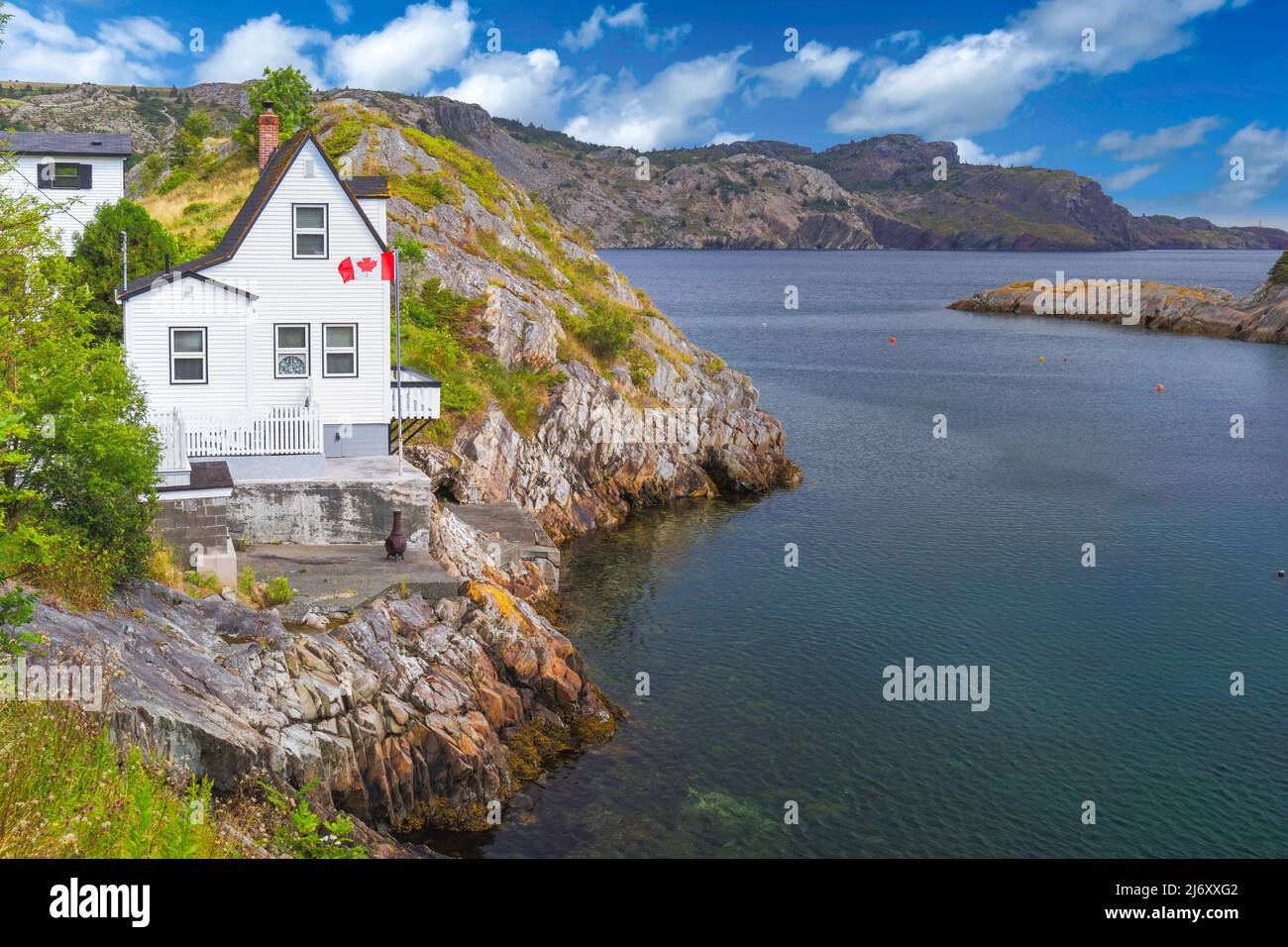 Traditional home along the rugged shores of Newfoundland, Canada. Stock Photo