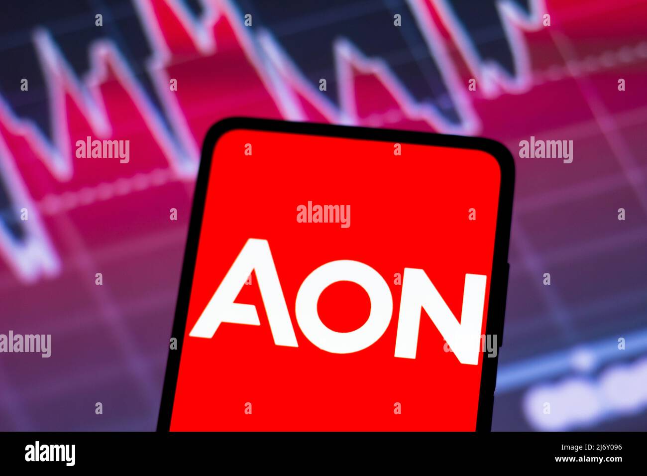 In this photo illustration the Aon plc logo seen displayed on a ...