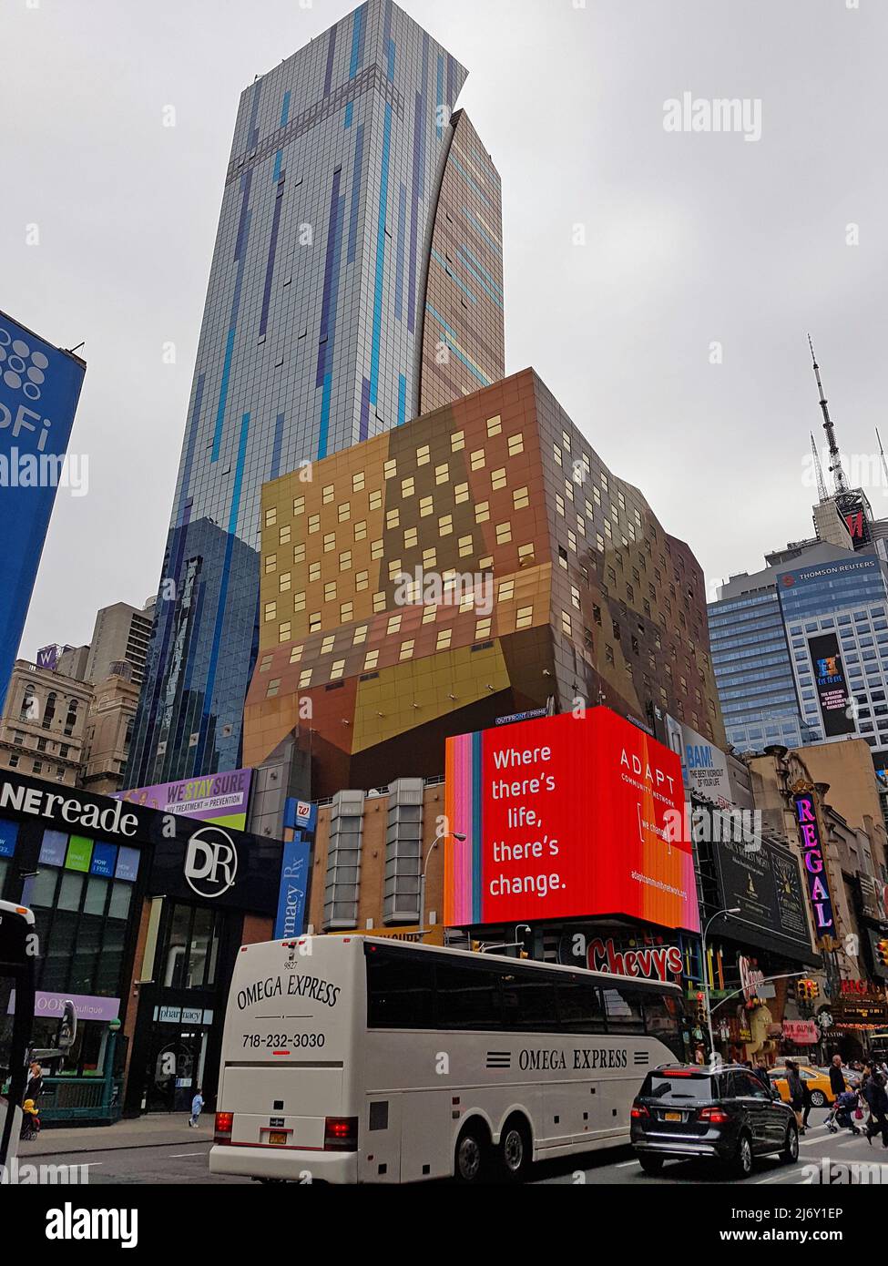 Busy street of the city with a lot of luminous advertising on the ...