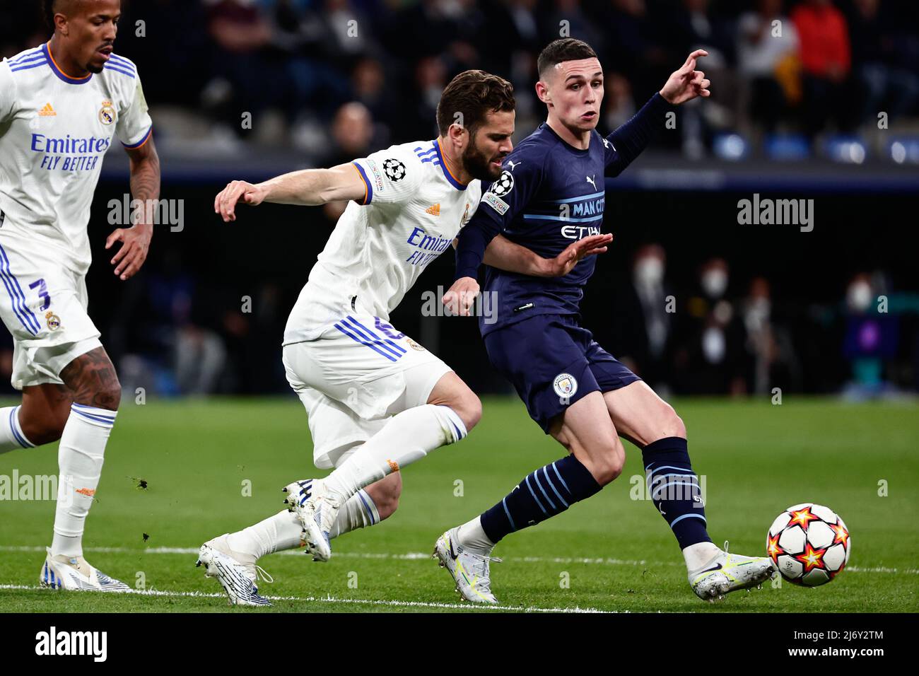 Spain. 04th May, 2022. Phil Foden of Manchester City in action with Nacho Fernandez of Real Madrid during the UEFA Champions League Semi Final Leg Two match between Real Madrid and Manchester City at Santiago Bernabeu Stadium in Madrid. Credit: DAX Images/Alamy Live News Stock Photo