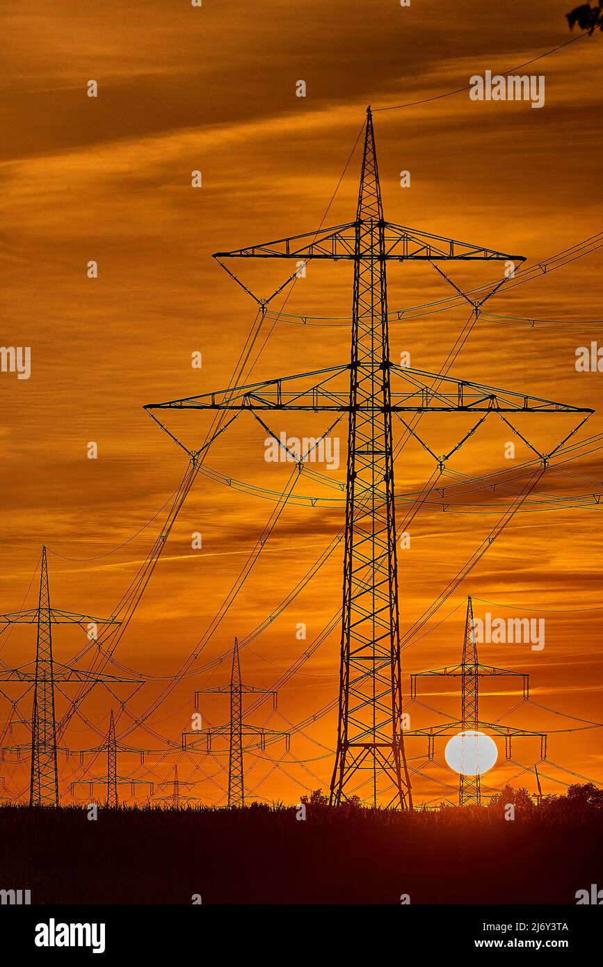 electricity transportation with hgh voltage wire on pylon Stock Photo