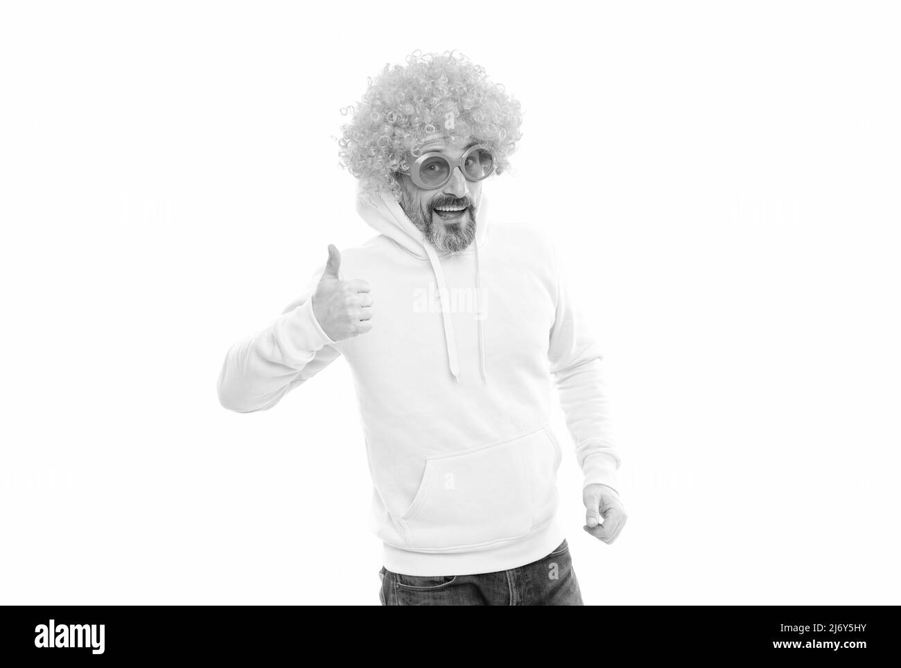 Funny man wear funky wig hair with party sunglasses showing thumbs up