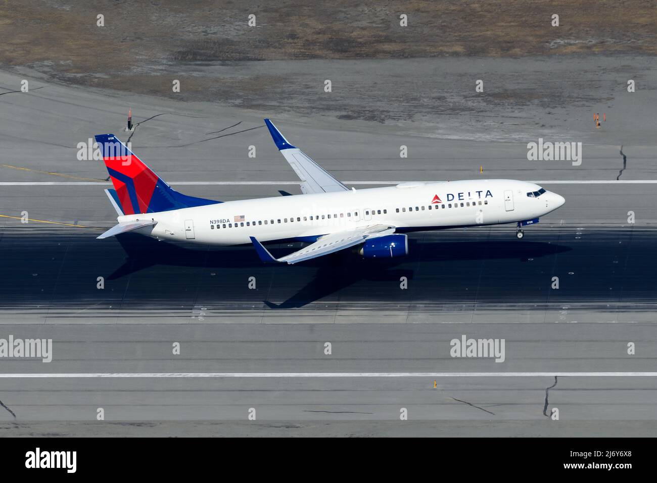 Delta Airlines Boeing 737800 airplane on approach to Anchorage Airport