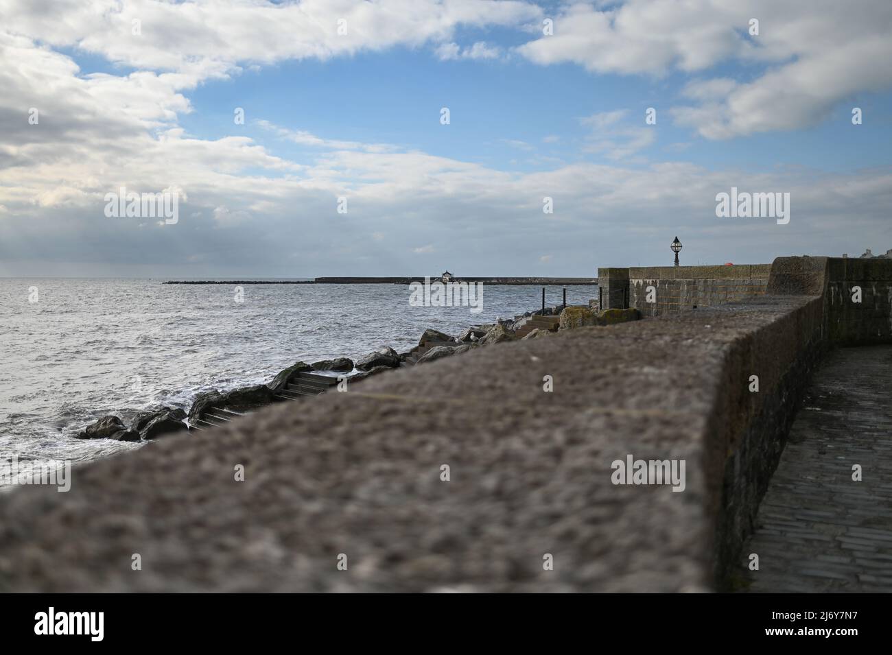 lyme Regis water front wall defence sea wall Stock Photo
