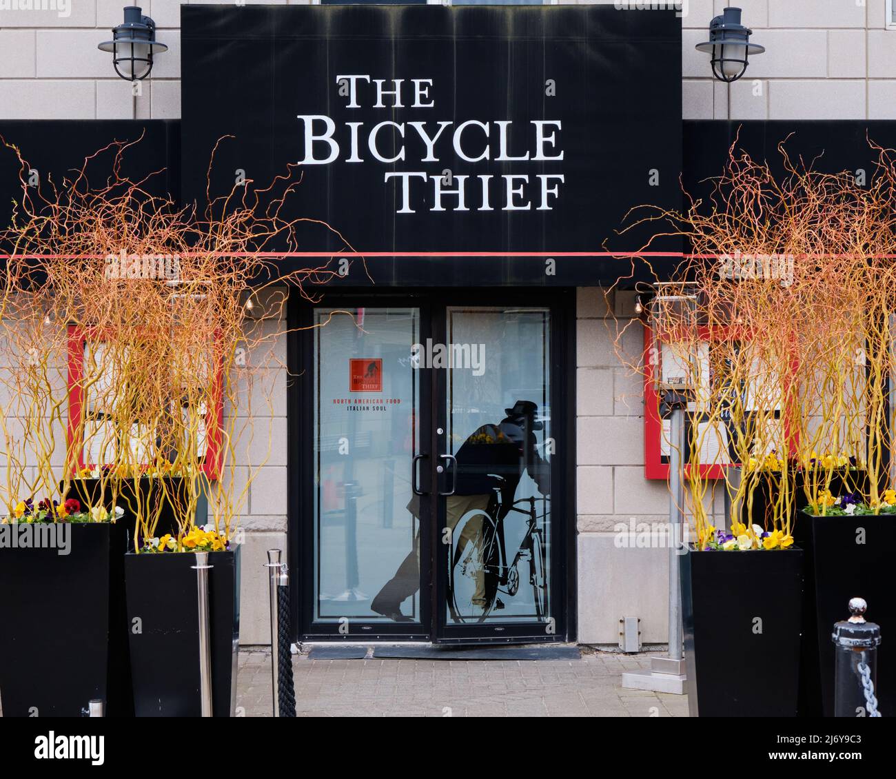 Street facade sign of The Bicycle Thief Restaurant on Waterfront