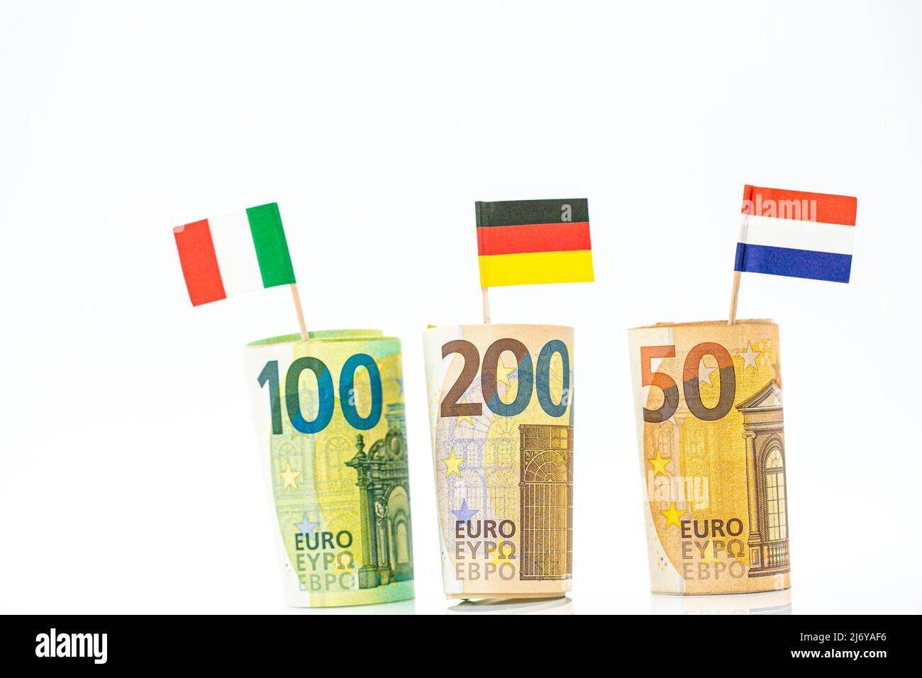 Money and flags of European countries.Flags of Germany, France and