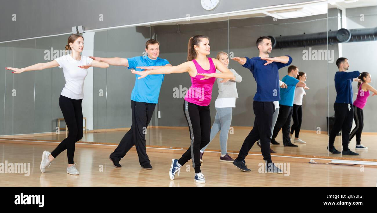 People practicing vigorous dance Stock Photo