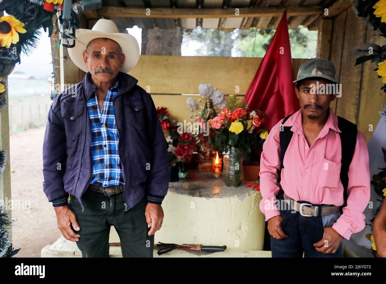 Members of the Xinca indigenous community stand guard on a road to prevent  operations at the Escobal mine, as Guatemalan and Argentine indigenous  communities say their lives have been severely affected by